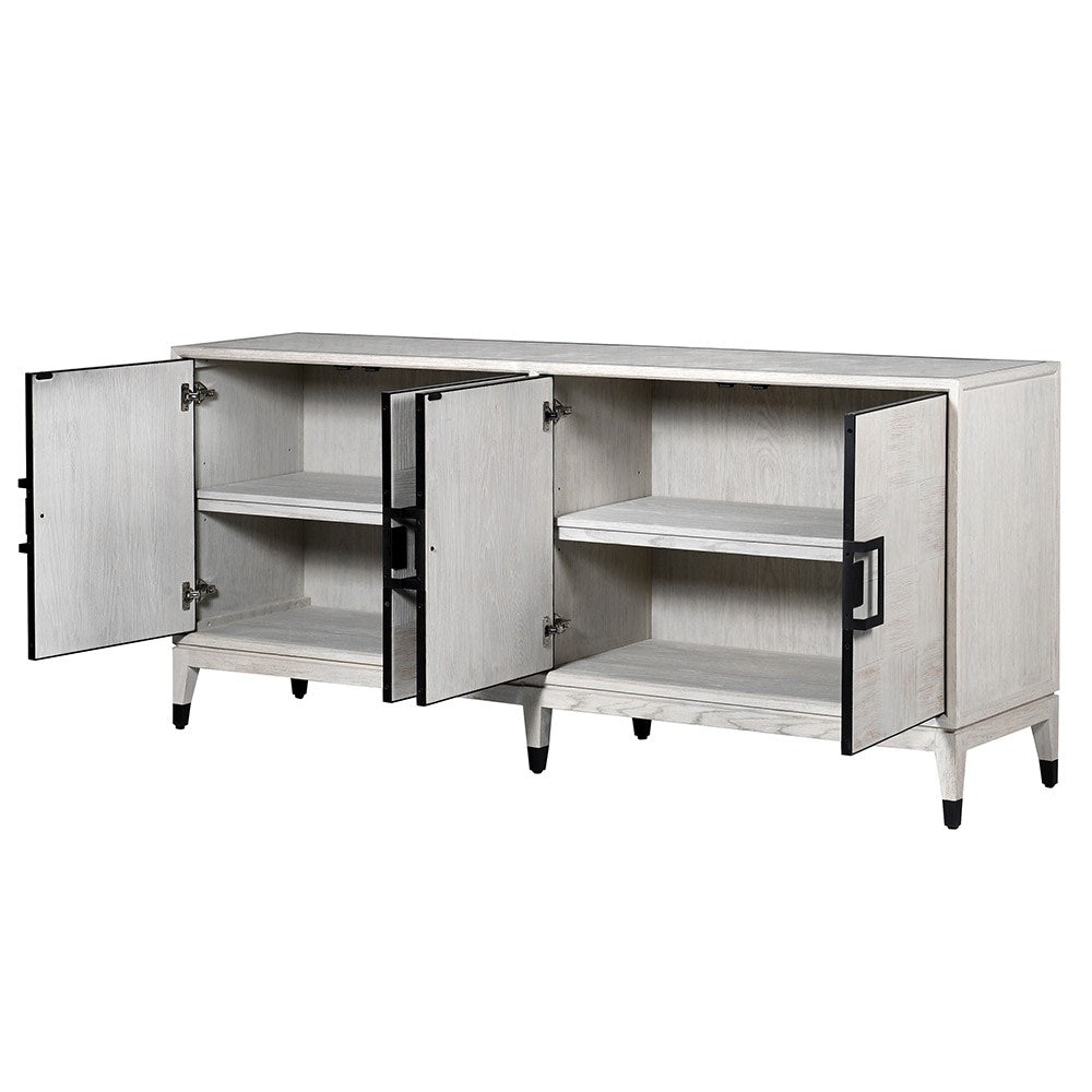 The Pasadena white oaks sideboard features four doors and is crafted from premium oak and oak veneer and finished in an off white with a square pattern detail.
 Its shelves are both adjustable and removable, providing versatility and convenience. 