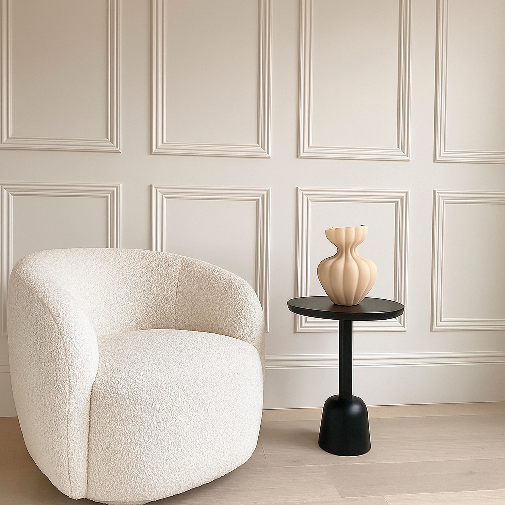 The Petal Bloom Vase is a stunning sculptural piece that brings soft elegance to any interior. Crafted from matte-finished glass in a warm beige tone, its organic silhouette mimics the gentle curves of flower petals in mid-bloom. The fluted body and wavy rim create a delicate, feminine profile—ideal as a standalone accent or for showcasing minimalist floral arrangements. A perfect blend of modern design and natural inspiration, this vase adds a touch of serene sophistication to any space.