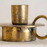 Rustic brass candle holder with loop handle