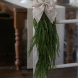 CHRISTMAS SWAG DECORATION HANGING ON DOOR