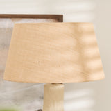 Handmade sculptural lamp with beige shade and neutral decor