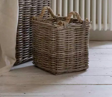 Small kubu square basket with rope handles on wooden floor