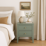 Meet our gorgeous Stockton two drawer Pigeon green bedside table featuring tapered legs, cut lines, wooden runners on drawers and brass style handles.
Dimensions:
H60cm W 40cm D 40cm
