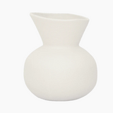 Decorative sculptural stoneware vase in soft white finish