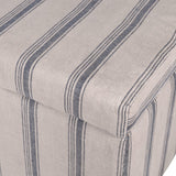 Close-up of a fabric with blue stripes on a beige background