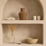 The Terra Forma Vase is a handcrafted ceramic piece inspired by the natural contours of wind-shaped desert landscapes. Its earthy brown finish and organic silhouette bring a grounded, rustic elegance to any space. Perfect for dried floral arrangements or as a standalone statement piece, this vase adds texture and warmth to minimalist and bohemian interiors alike. Each vase is uniquely shaped, embracing subtle imperfections that highlight its artisanal charm.
Dimensions:
H 20.5cm W 15cm