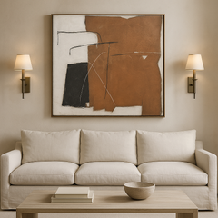 Terracotta and white abstract wall art canvas hanging in a modern living room.