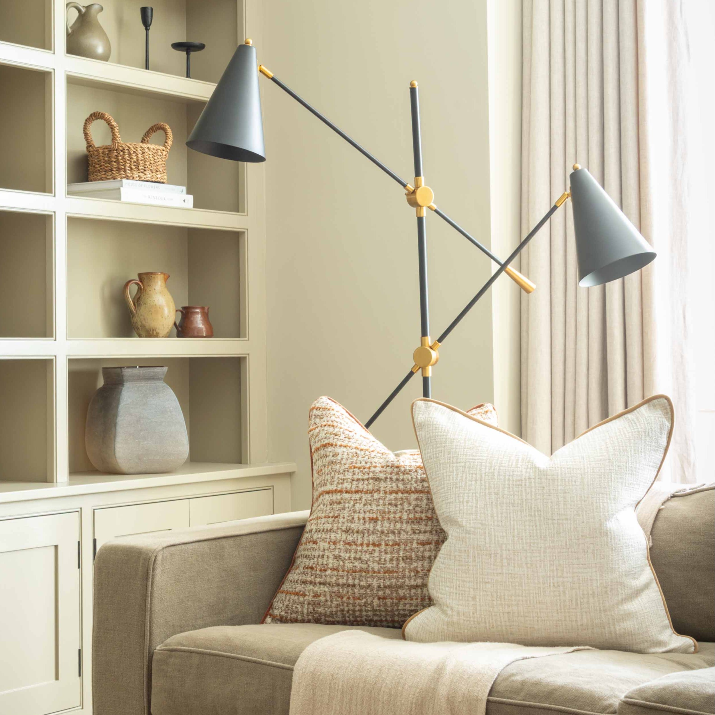 Elevate your interior with our light cream cushion, designed to seamlessly complement both warm and cool-toned decor. Crafted from a soft, textured fabric, this cushion features subtle beige flecks that add a layer of visual depth and natural charm. The rich amber piping provides a refined contrast, making it a standout accent on sofas, armchairs, or beds. Whether styled solo or in a curated set, this versatile cushion brings understated elegance and cozy comfort to any room.