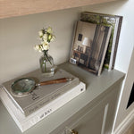 Add a touch of timeless charm to your home decor or office desk with this vintage-style magnifying glass. Featuring a polished metal frame and a classic wooden handle, this decorative piece blends functionality with elegance. Whether used for reading fine print, inspecting small objects, or simply as a stylish tabletop accessory, this antique-inspired magnifying glass is perfect for enhancing any modern farmhouse, rustic, or traditional interior.
Perfectly styled atop coffee table books like "Pacific Natur