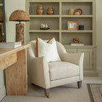 Elevate your home décor with this elegant white bouclé cushion, featuring a refined 4cm contrasting velvet band for a touch of timeless sophistication. Crafted with a textured bouclé fabric, this cushion adds depth and softness to any setting. The luxury feather inner offers superior comfort and a plush feel, making it both a stylish and cozy addition to your living room, bedroom, or reading nook. Perfect for neutral, minimalist, or modern interiors, this decorative cushion blends seamlessly into any space