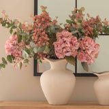 Elevate your home decor with our ceramic vase available in three sizes, perfect for creating a sophisticated and timeless aesthetic. Handcrafted with a smooth matte finish, this elegant neutral-toned vase blends effortlessly with any interior style—from modern minimalist to rustic farmhouse. Whether used as a centerpiece for fresh blooms, dried flowers, or as a standalone accent, this versatile decorative vase adds charm and dimension to consoles, mantels, and shelves.
Available in small, medium, and large