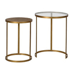 A beautiful set of two nesting tables crafted from Iron and finished in warm gold tones finished with a rattan top in the smaller and glass in the large.