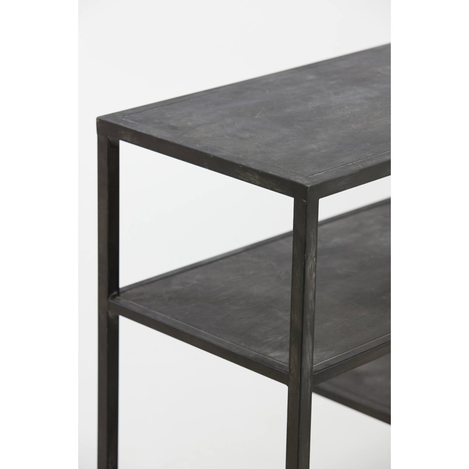 Side view of black console table with shelving