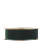 Spool of green ribbon on a white background