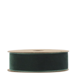 Spool of green ribbon on a white background