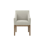 The Marisia Linen Effect Dining Chair boasts a warm wooden frame and bisque linen upholstery. Its spacious seat, built-in arms, and traditional design provide both comfort and timeless elegance in a versatile neutral tone.