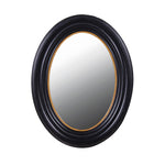 This traditionally styled oval mirror features a black frame with gold inlay.