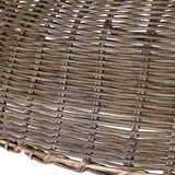 Close-up view of woven rattan texture on dome-shaped pendant light
