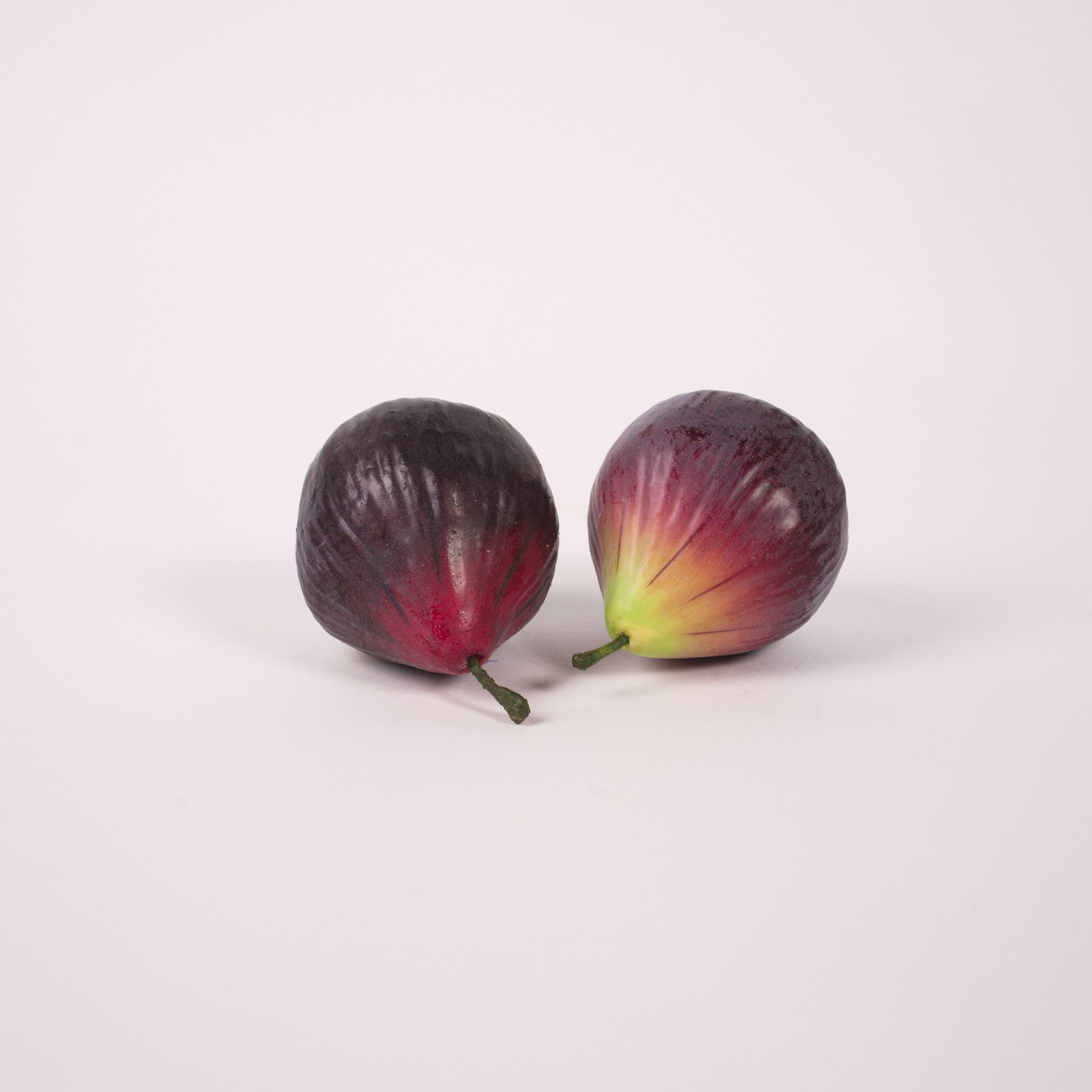 A set of 3 faux figs perfect for adding a touch of life and colour wherever they are placed.