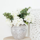 Close-up of Charles Ted Marlowe Stone Pot in natural stone finish