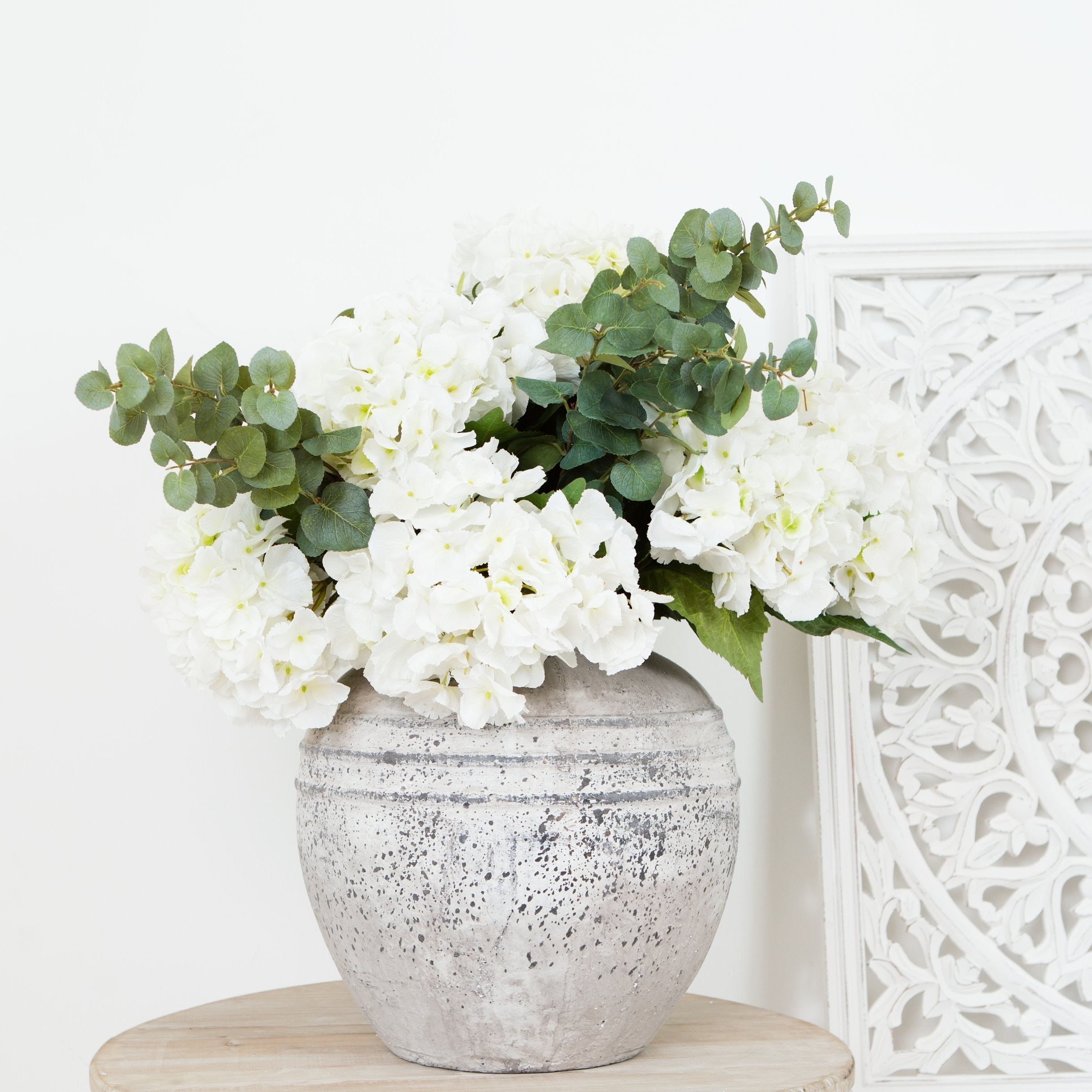 Close-up of Charles Ted Marlowe Stone Pot in natural stone finish