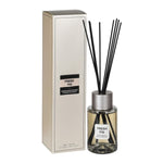 Fresh Fig reed diffuser with glass bottle and black reeds beside packaging
