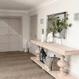 Large acacia wood console table supported by two balustrades