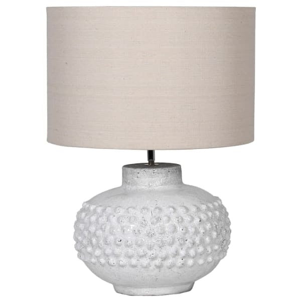 Textured white ceramic table lamp with beige linen drum shade – modern rustic home décor accessory