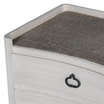 stunning three drawer bedside table in a white wash with a rattan finish.