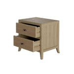 A two-drawered bedside table crafted from grey aged oak and adorned with oak veneer. Its rattan latticed front features smooth sliding drawers on wooden runners, painted soft grey. Tapered legs and small round gun metal handles enhance its elegant design.