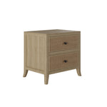 A two-drawered bedside table crafted from grey aged oak and adorned with oak veneer. Its rattan latticed front features smooth sliding drawers on wooden runners, painted soft grey. Tapered legs and small round gun metal handles enhance its elegant design.