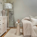 A stunning floor lamp in a beautiful turned pale wood complete with off white linen shade.