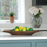 faux lemons in a fruit bowl