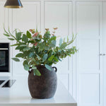 brown stoneware vase with handles
