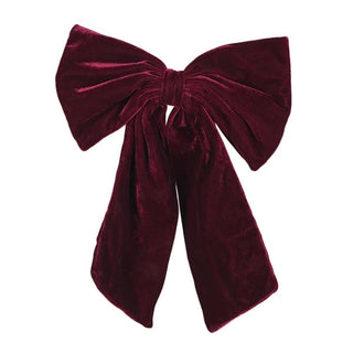 Maroon velvet bow on a white background