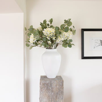 Indulge in the luxurious faux Eucalyptus Spray Bundle in a sophisticated color combination of grey and green.