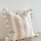 Beige and cream striped cushion with ruffled edges