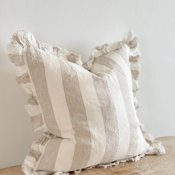 Beige and cream striped cushion with ruffled edges