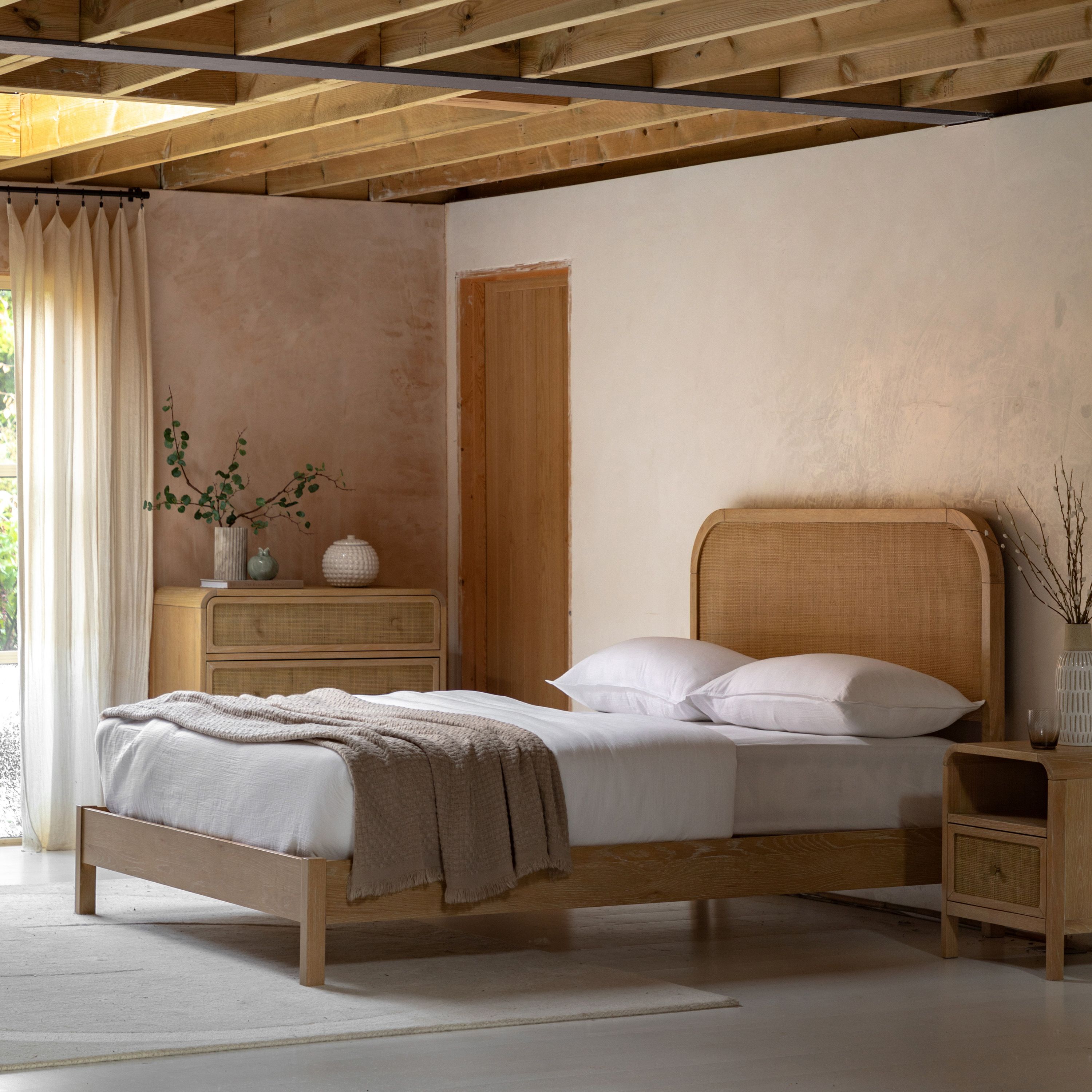 Cheltenham rustic oak bed styled in a neutral bedroom setting