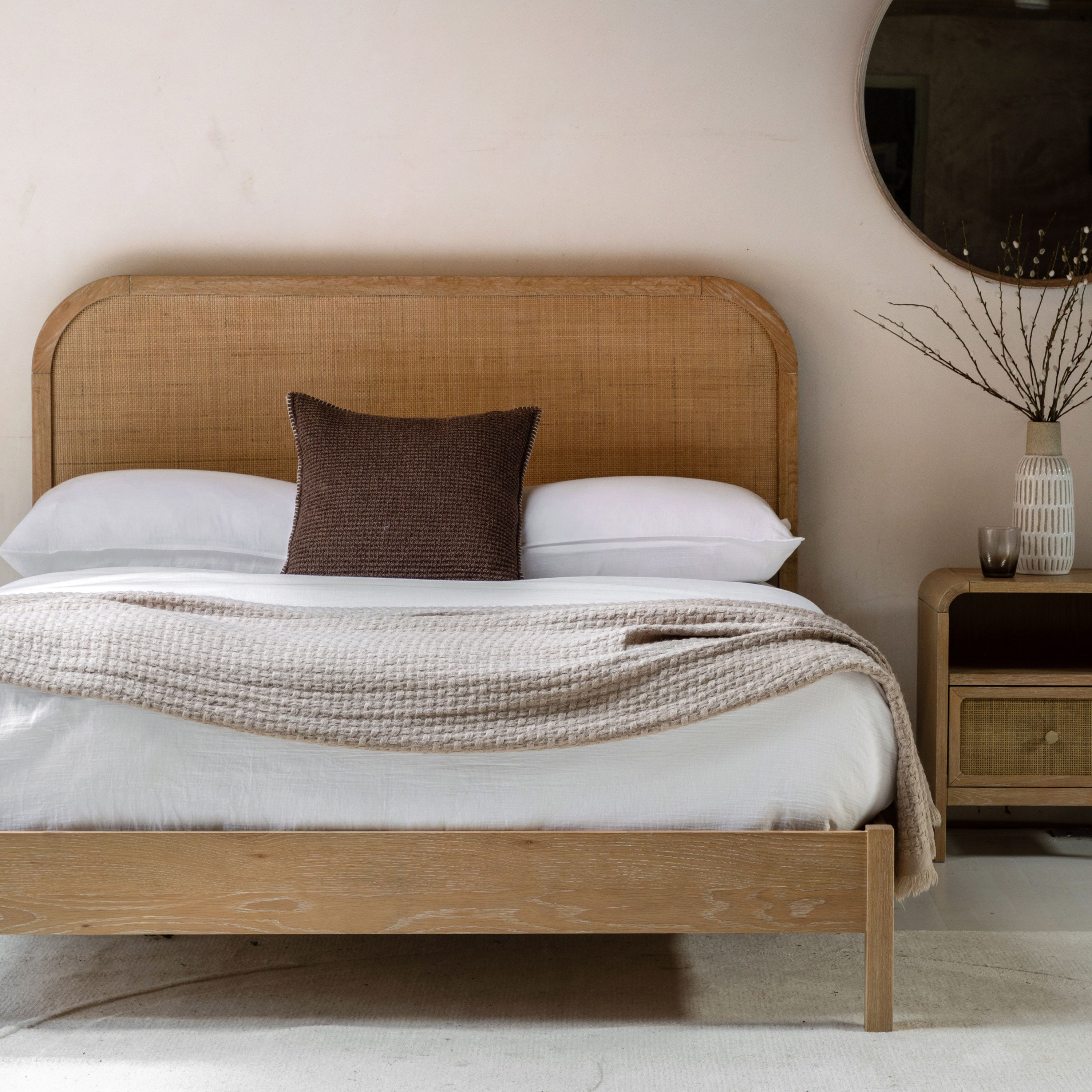 Cheltenham rustic oak bed styled in a neutral bedroom setting
