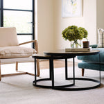 A beautiful set of two occasional tables with antiqued black Metal legs and Bronzed Tops