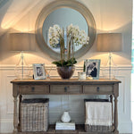 Three-drawer console table made from reclaimed, weathered pine