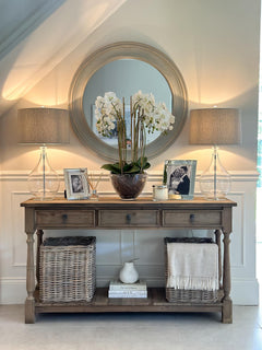 Three-drawer console table made from reclaimed, weathered pine
