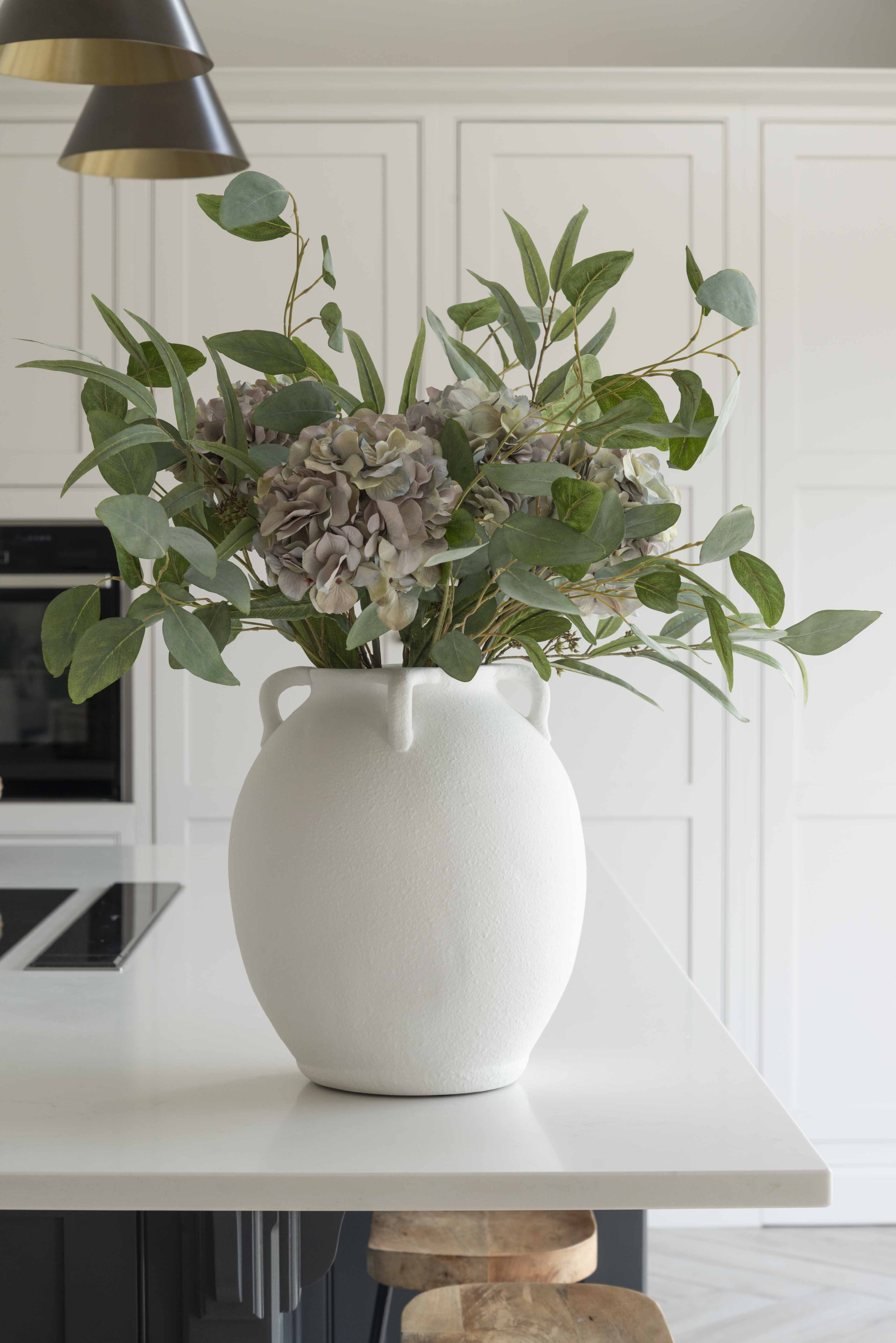 White terracotta vase with handles