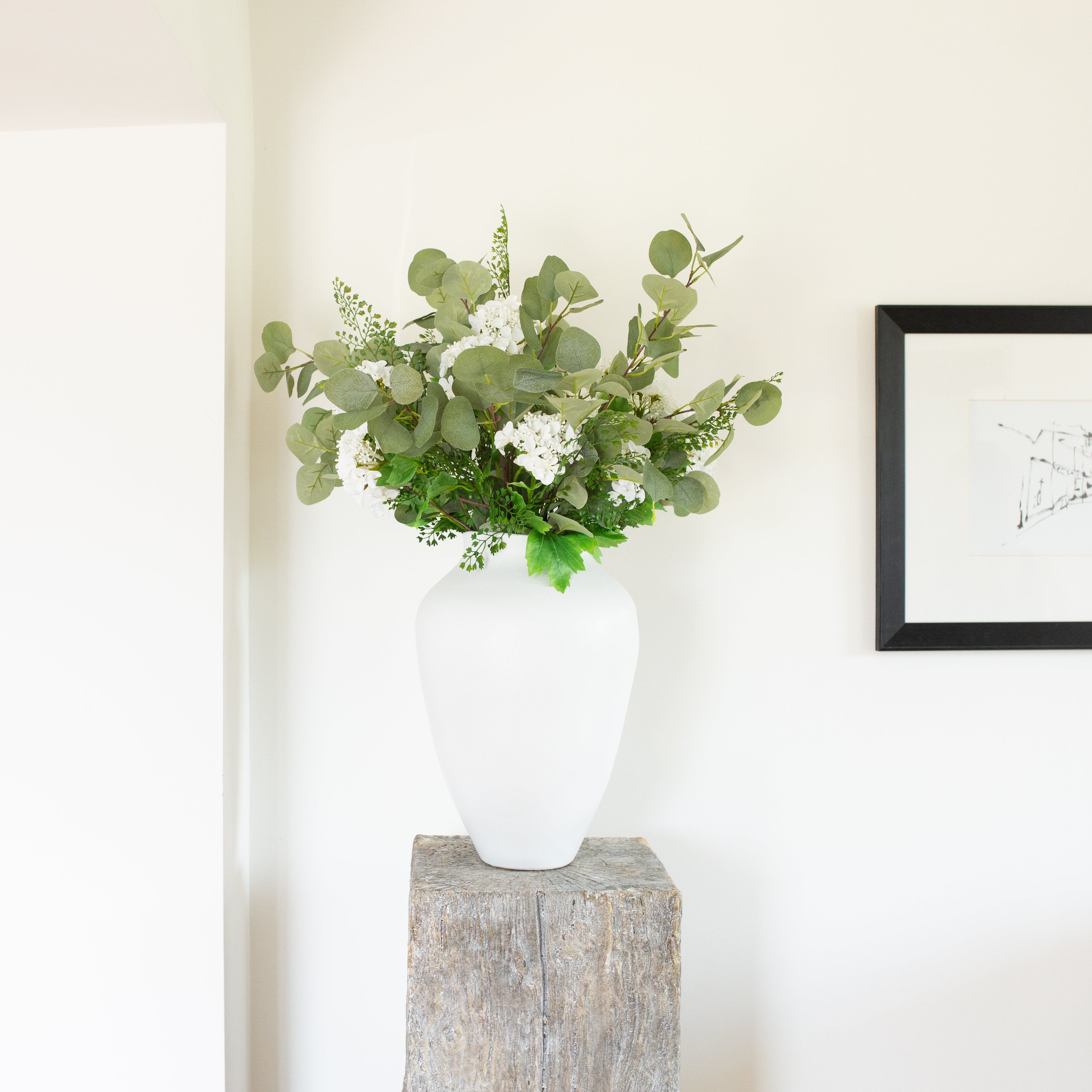 Indulge in the luxurious faux Eucalyptus Spray Bundle in a sophisticated color combination of grey and green.