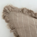 A beautiful linen cushion in taupe with white stripe running through and ruffled edges
