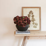 Elliptical black pot