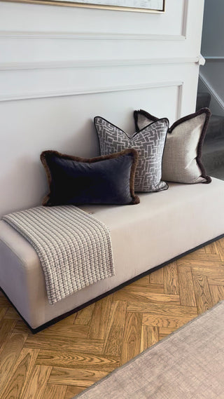 Naunton angelite gold fringe rectangle cushion styled on a sofa