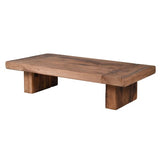 This elegant coffee table is crafted from chunky, reclaimed oak, showcasing a tasteful blend of rustic charm and eco-conscious luxury.