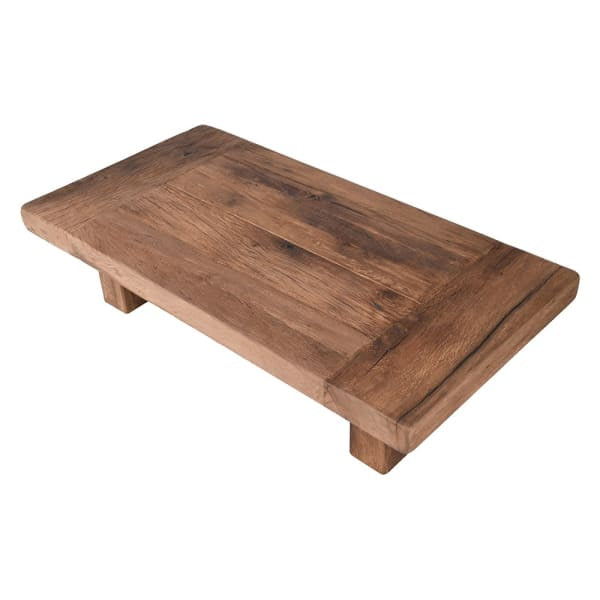 This elegant coffee table is crafted from chunky, reclaimed oak, showcasing a tasteful blend of rustic charm and eco-conscious luxury.
